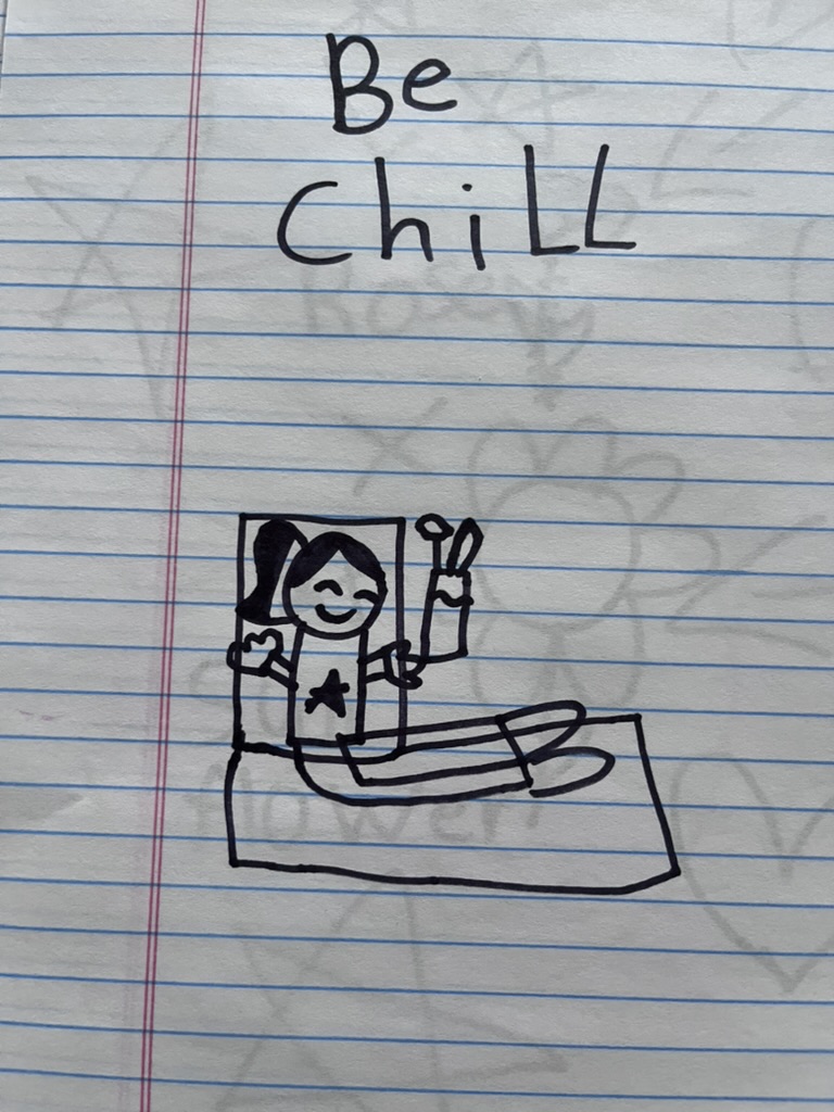 A child-drawn illustration featuring a smiling girl lying on a blanket, holding a pair of drumsticks, with the text 'Be Chill' written above.